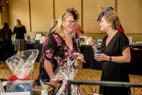 Two women talking and laughing