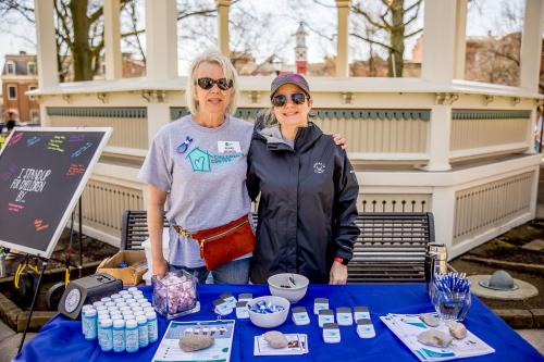 Joan Pritchett and Amy Cox at the Outreach Table